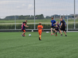 Laatste training S.K.N.W.K. JO11-1JM (partijtje tegen de ouders) van maandag 27 mei 2024 (112/137)